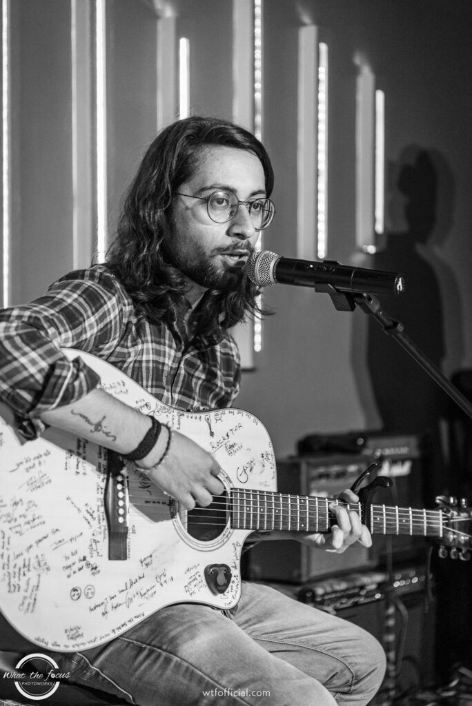 Open mic at rock n' roll pad