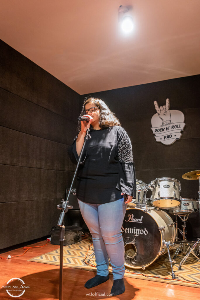 Open mic at rock n' roll pad