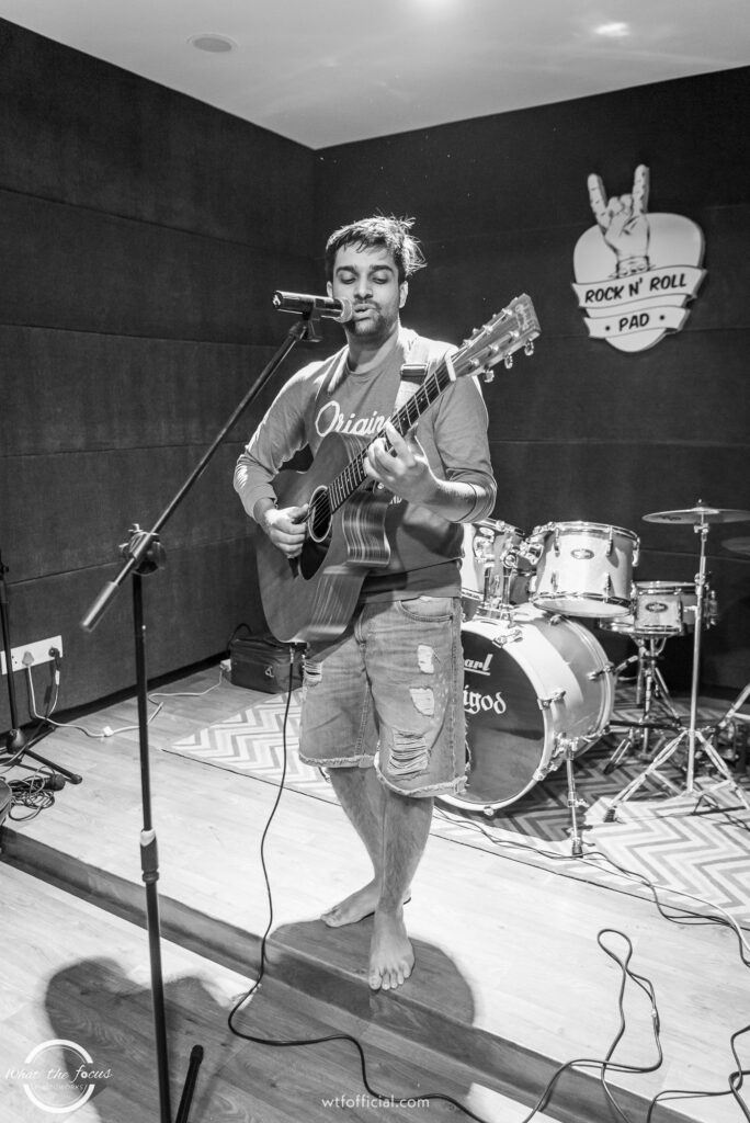 Open mic at rock n' roll pad